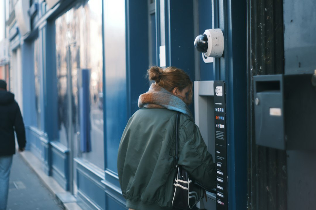 store detective watching surveillance